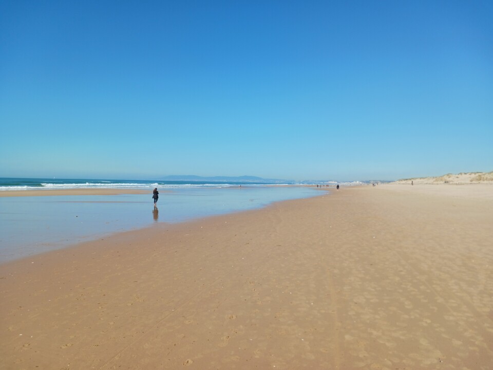 Pela praia