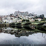 Cidade de Coimbra refletindo no Rio Mondego